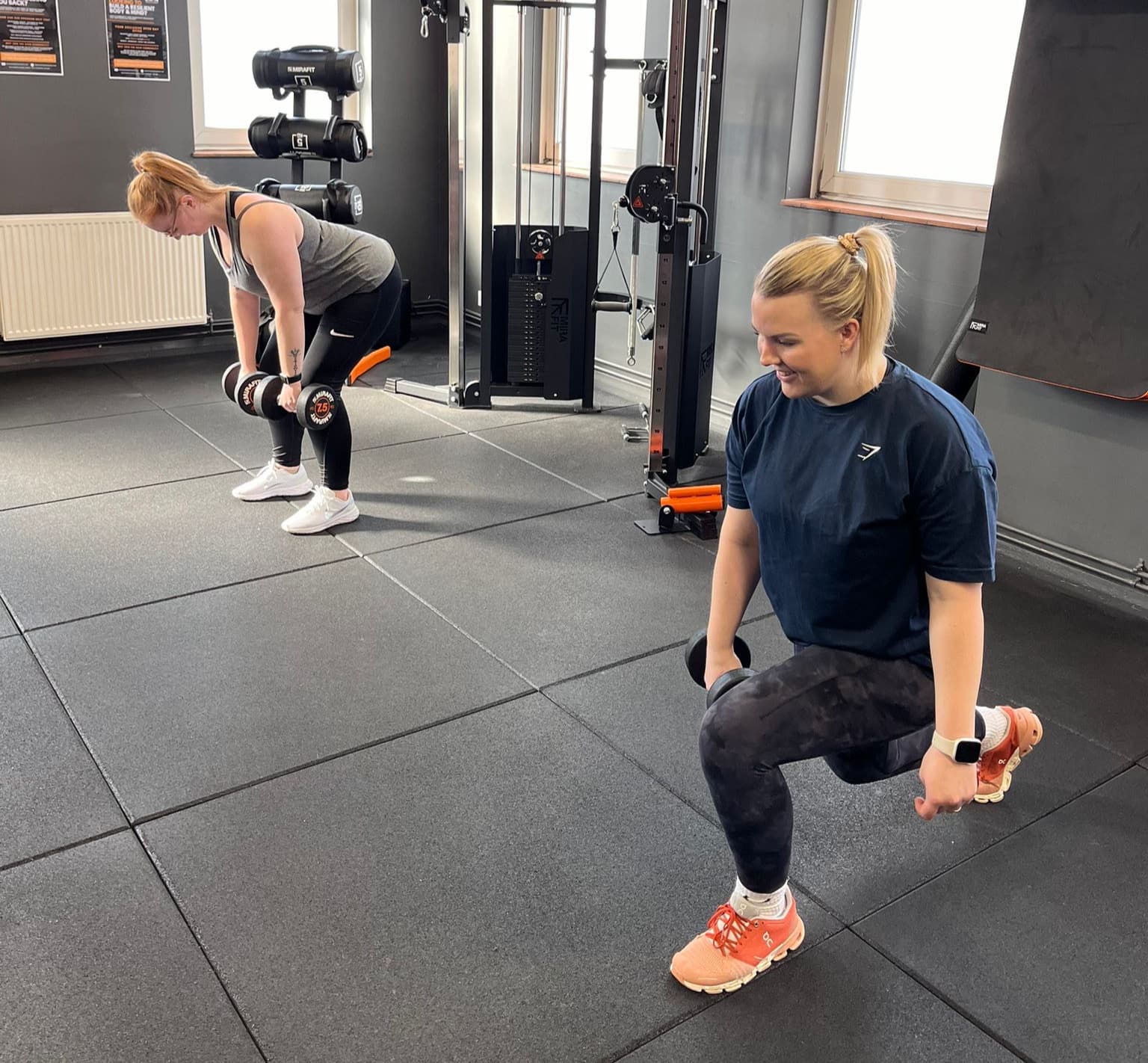 Members doing lunges in the gym